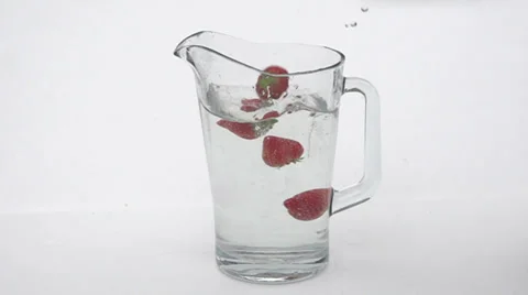 Slow motion falling strawberries Stock Footage 33802173