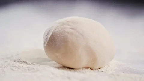 Slow Motion Of Falling Yeast Dough Into Flour Stock Footage 231303582