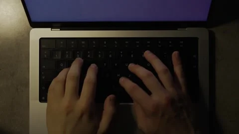 Slow Motion Fast Typing on a Laptop – High-Angle Close-Up Office Shot Stock Footage 308648114