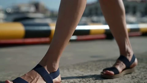 Close-up of women's feet in sandals, Stock Video