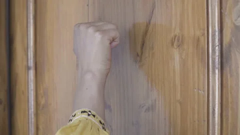 Slow motion of female hand touching wooden door, door opens Stock Footage 153168537