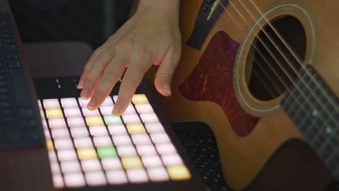 Slow motion of female hands producing music Stock Footage 113940407