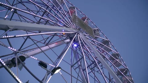 Slow Motion Of Ferris Wheel In The Evening Video stock 235971637