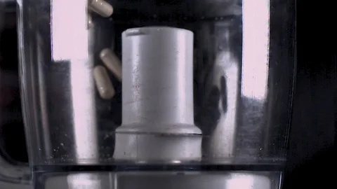 Slow Motion Filming of Blender destroying, breaking, exploding &amp; Blending Things Stock Footage 124245280