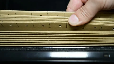 Slow Motion Finger Browsing Through File Folders Video stock 320497331