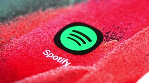 Slow motion finger pressing spotify application icon on modern 5G smartphone. Video stock 158370296