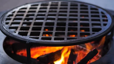 Slow motion. fire is burning on the charcoal grill.Ofyr charcoal grill. close-up Stock Footage 126812306