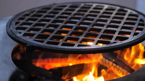 Slow motion. fire is burning on the charcoal grill.Ofyr charcoal grill. close-up Stock Footage 126812350