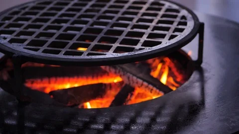 Slow motion. fire is burning on the charcoal grill.Ofyr charcoal grill. close-up Stock Footage 126812356