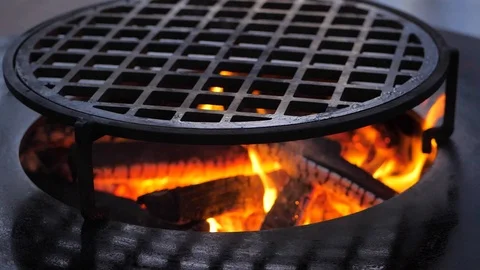 Slow motion. fire is burning on the charcoal grill.Ofyr charcoal grill. close-up Stock Footage 126812370