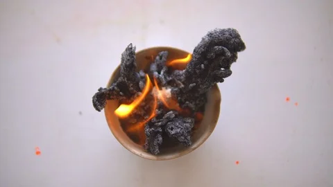 Slow motion fire burning chemical reagent in crucible on white table 库存影片 111485388
