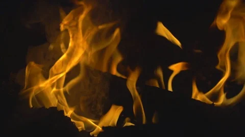 Slow motion fire flame burning glowing on night, smoke and flame floating  Stock Footage 122893579