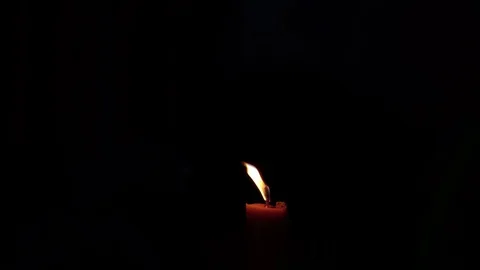 Slow motion fire flame candle glowing on black night background Stock Footage 116912278