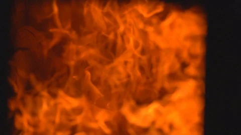 Slow motion fire flame cremate death people on dark background, red fire flame Видео 120941771