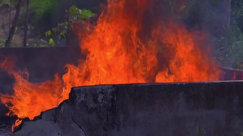 Slow motion fire flame glowing and cement wall Vidéo 116912724