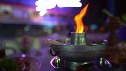 Slow motion fire grow burning on lantern on dark night background Video stock 116910879