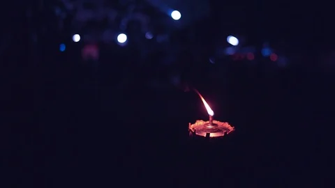 Slow motion fire grow burning on lantern on dark night background Stockbeeldmateriaal 116912049
