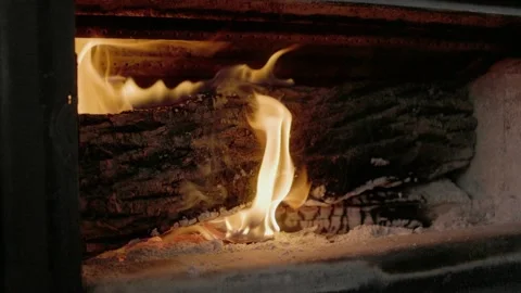 Slow Motion Fire Inside Wood Stove Vídeo Stock 235218038