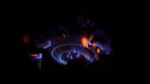 Slow-motion of fire light up on gas stove, gastronomy concept Stock Footage 120763171