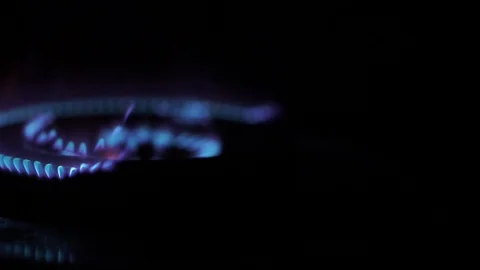 Slow-motion of fire light up on gas stove, gastronomy concept Stock Footage 120763175