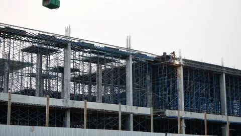 Slow motion fire sparkling, worker welding steel structure of construction site  Stock Footage 89233548