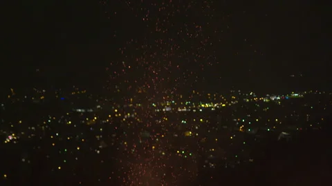 Slow Motion Of Fire Sparks against the backdrop of the night city Stock Footage 267009945