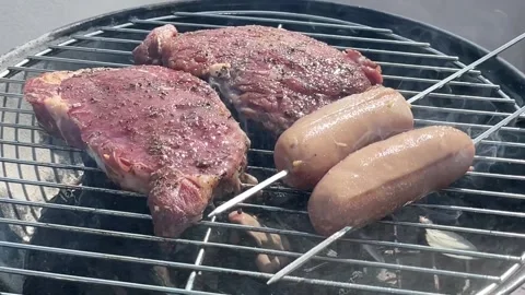 Slow motion of fire sprouting on the grill Stock-Footage 168771656