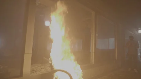 Slow motion of firefighter fire man searching the fire conflagration building Video stock 108995066