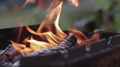Slow motion fireplace for bbq, nature yellow fire. Burning wood in the fireplace Stock Footage 95945588