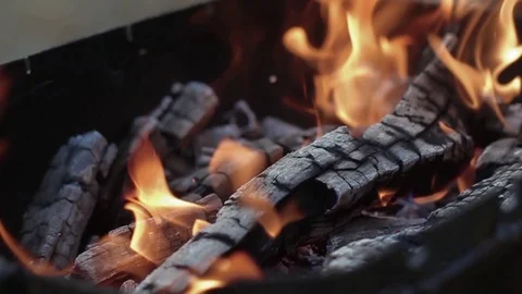 Slow motion fireplace close up for bbq, nature yellow fire. Burning wood in the Stock Footage 95945540