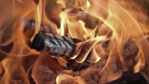 Slow motion fireplace closeup for bbq, nature yellow fire. Burning wood in the Stock Footage 95945445