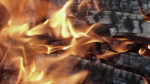 Slow motion fireplace closeup for bbq, nature yellow fire. Burning wood in the Stock Footage 95945487