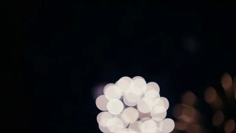 Slow motion fireworks in bokeh 動画素材 77254154