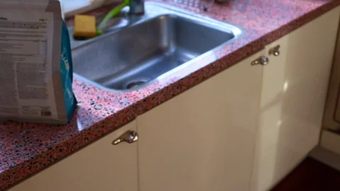 Slow motion of fit young man making protein shake - 8 sec Stock Footage 126902727