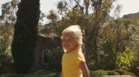 Slow motion of five children running round camera in park. Stock Footage 43673149