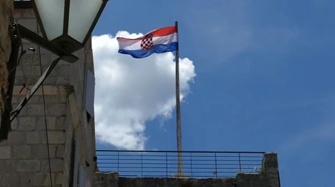 Slow Motion - Flag on Tower Stock Footage 54897245