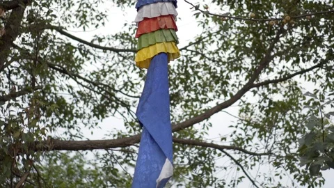 Slow motion of flag in the wind at religious temple in Nepal Stock Footage 91135965