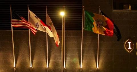 Slow motion of flags at the entrance of Intercontinental hotel in Downtown Los Stock Footage 81572517