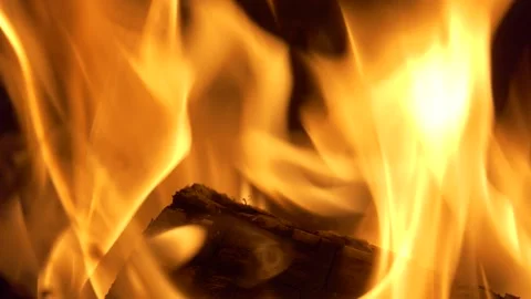 Slow motion. The flame of the fireplace. Burning wood in the fireplace. Video stock 143586763