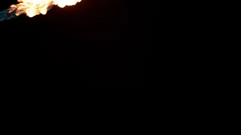 Slow motion flamethrower on black background Stock Footage 111560896
