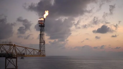 Slow motion of flare burning bridge of oil and gas platform or offshore platform Stock Footage 168181581