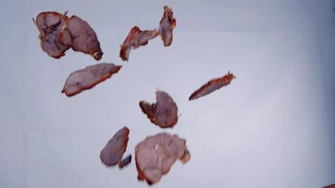 Slow motion flip meat beef slice up in the air Stockbeeldmateriaal 169072166
