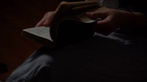 Slow motion flipping through Bible Stock Footage 107325759