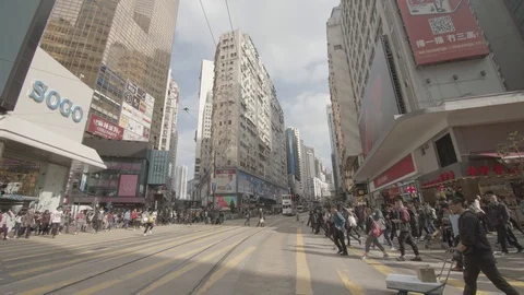   Slow motion ，The flow of people at the zebra crossing in Hong Kong Stock Footage 123034330