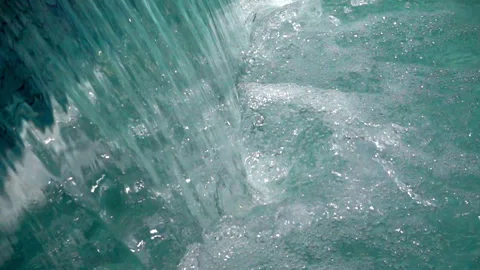 Slow Motion Flow of Water. Waterfall Splashes and Foam abstract Background. Stock Footage 89679870