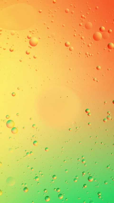 Slow Motion of Flowing Oil Bubbles in Water. Stock Footage 298722395