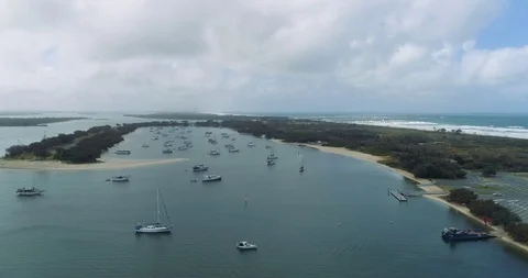 Slow motion fly up aerial 4k with jahts watercrafts Gold Coast Australia Stock Footage 99362089