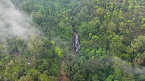 Slow Motion Fly In Waterfall through clouds Stock Footage 340969741