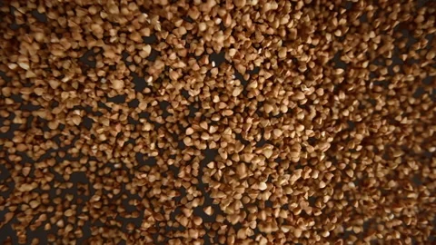 Slow motion of flying buckwheat on a black background Vídeo Stock 148164666