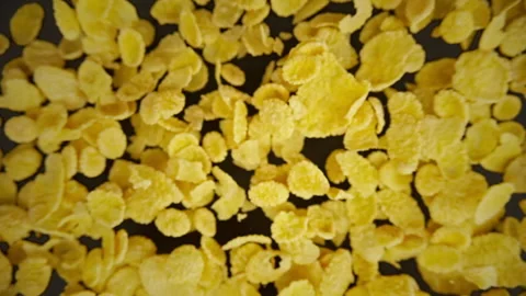 Slow motion of flying dry breakfast on a black background Stock Footage 148162898